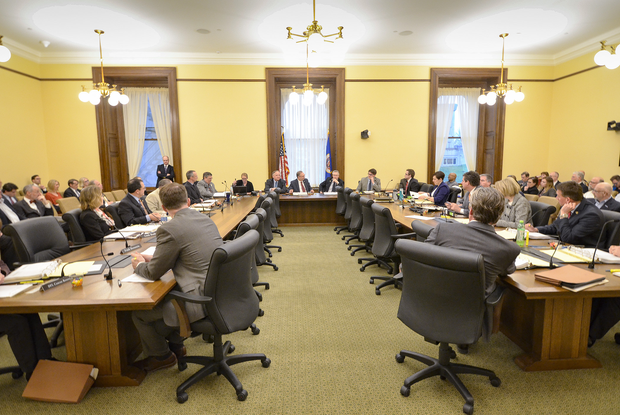 The omnibus transportation conference committee meets for the first time April 19 to do a walk-through of the House and Senate proposals and review tracking sheets. Photo by Andrew VonBank